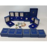 A collection of twenty three Halcyon Days enamel boxes (23) There are 13 boxed enamels and 23 in