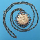 An Edward VII sovereign, 1910, in a 9ct gold pendant mount, and a chain 20.3g (all in)