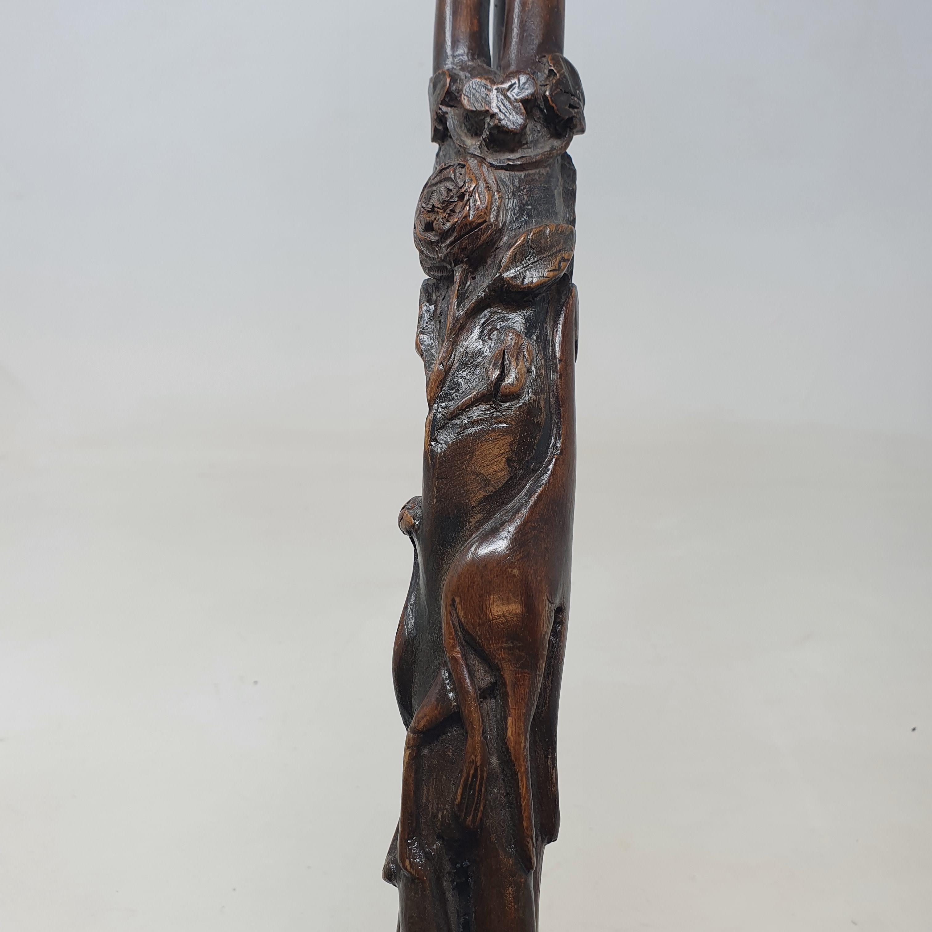 A 19th century folk art walking stick, the handle carved in the form of a talon gripping an egg, - Image 8 of 12