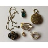 A locket, with engraved decoration, a seed pearl brooch, and other items
