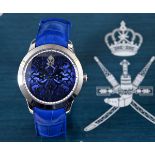 A gentleman's 18ct gold Omani presentation William & Son, London wristwatch, with a blue dial (