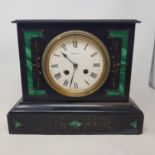 A mantel clock, the 13 cm diameter enamel dial signed Uaber Son, in a polished slate and malachite
