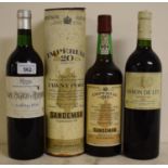 A bottle of Cosme Palacio Y Hermanos, 1994, a bottle of Baron de Ley Rioja, 1994 and a bottle of
