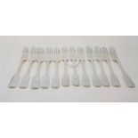 A set of twelve William IV silver fiddle pattern table forks, initialled, London 1837, 28.7 ozt,
