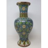 A cloisonné vase, of inverted baluster form, decorated flowers and foliage, slight damage/loss to