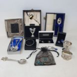 A silver plated and blue stone necklace and matching earrings, two silver teaspoons, and various