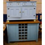 A painted oak top kitchen cabinet, 142 cm wide, and a painted dresser (2)
