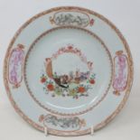 A 19th century Chinese famille rose plate, with central cartouche decorated European figures, 23
