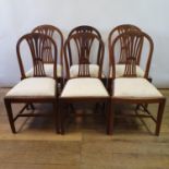 A harlequin set of six hoop back dining chairs with drop in seats, on square tapering legs (6)