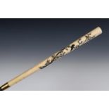A 19th century walking stick, with a Japanese Shibayama style ivory and hardstone inlaid handle,