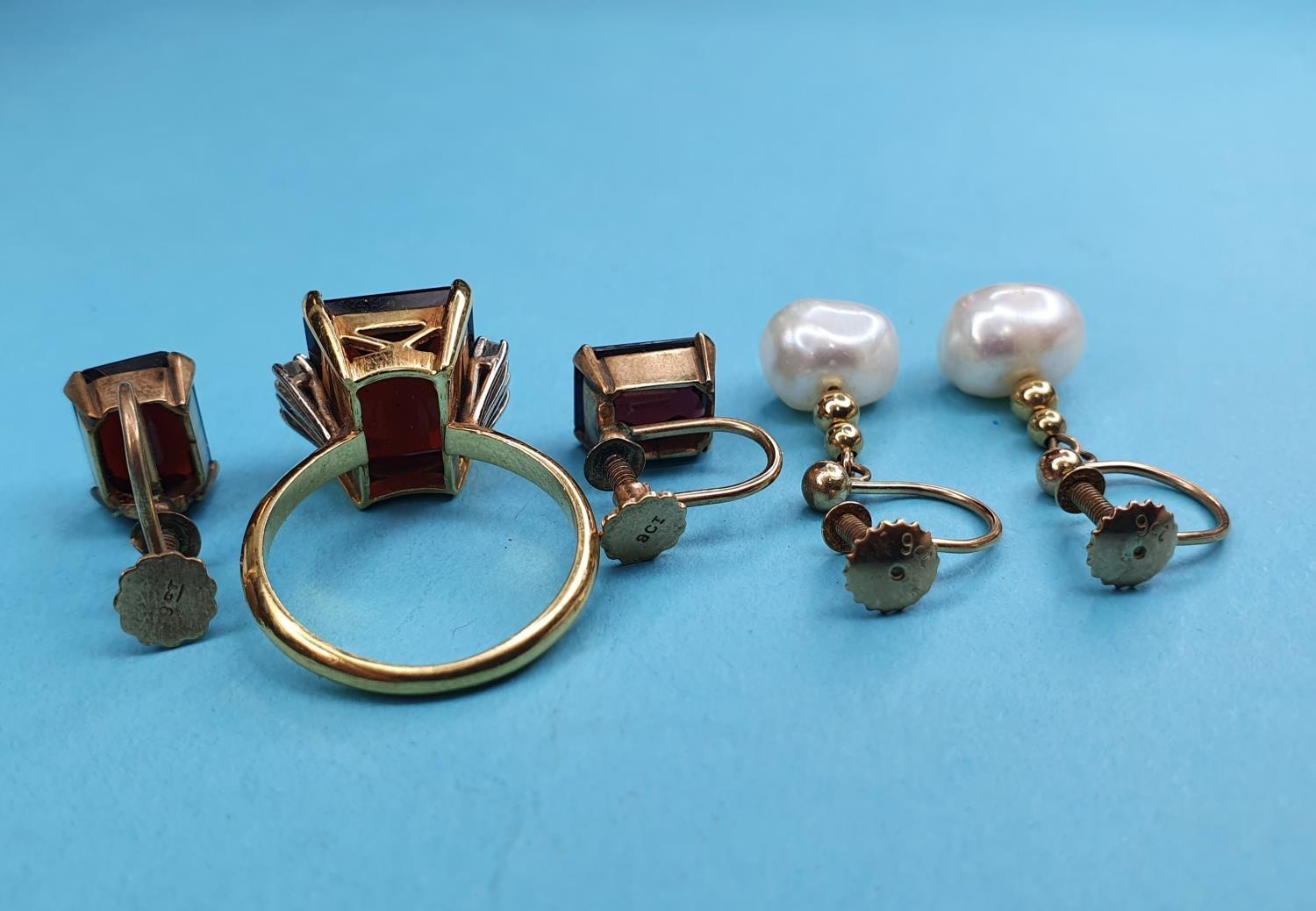 A yellow metal, garnet and diamond ring, ring size K½, with matching earrings, and a pair of pearl - Image 2 of 2