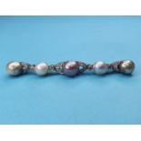 A pearl and diamond bar brooch