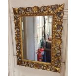 A Florentine style carved wood mirror, 74 x 56 cm
