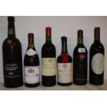 A bottle of Chateau Moncets, 1988, three other bottles of wine, a bottle of Thomas Hardy's Ale 1968,