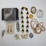 A 1920's oval brooch, set paste stones and other costume jewellery