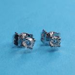 A pair of 18ct gold and diamond stud earrings RB approx. 3.4 mm diameter, no visible inclusions