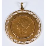 An American gold $20 coin, 1906, mounted as a pendant, 50.7 g (all in)