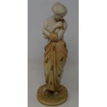 A Royal Worcester blush ivory figure, of a woman in classical pose, green mark to base, date mark