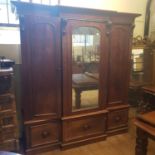 A 19th century mahogany breakfront compactum, on a plinth base, 190 cm wide