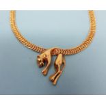A 9ct gold cat pendant, on a chain, 9.7 g Chain is 9ct gold