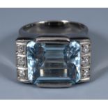 An 18ct white gold, aquamarine and diamond ring, ring size approx. J
