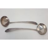 A pair of 18th century provincial silver ladles, marked Sterling, the bowls initialled I B, 3 ozt