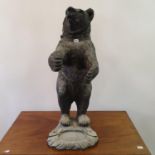 A modern Black Forest style bear stick stand, 83 cm high This item is made of resin or fibreglass,