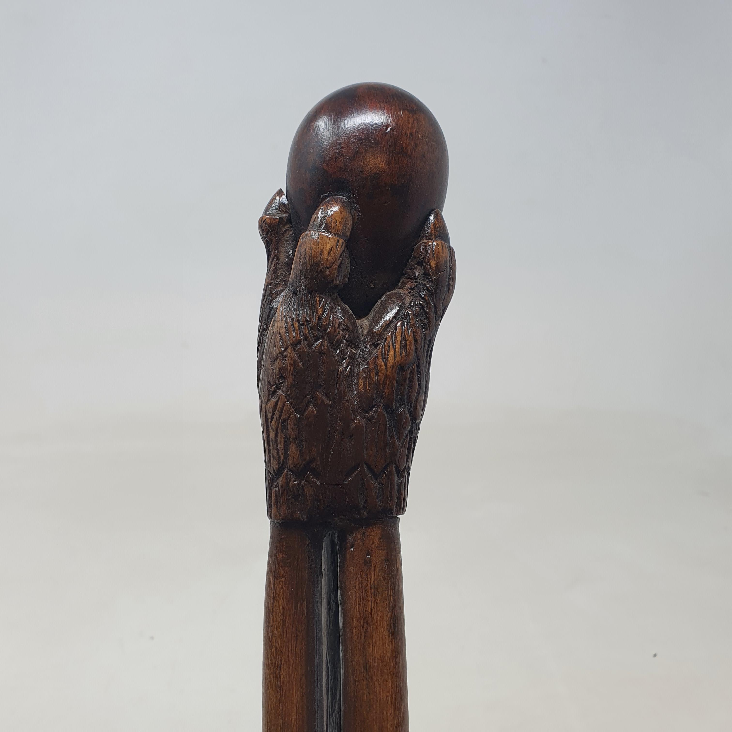 A 19th century folk art walking stick, the handle carved in the form of a talon gripping an egg, - Image 5 of 12