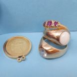 An 18ct gold, ruby and diamond ring, a Dutch five guilder gold coin in yellow metal mount, three