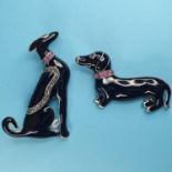 An Art Deco style black enamel dog brooch, and another similar (2)