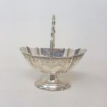 A silver swing handle basket, with engraved decoration, Sheffield 1888, 7.9 ozt