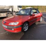 A 1999 Peugeot 306 convertible Registration number T759 VHO MOT expires November 2021 Metallic