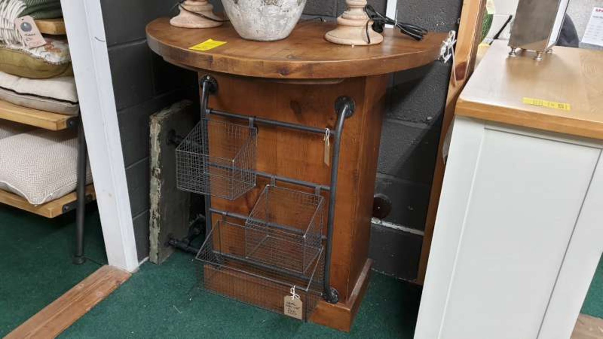 SOLID WOODEN ROUNDED DISPLAY UNIT (AS SEEN) WITH A PIPE DESIGN METAL WALL UNIT AND A PIPE DESIGN