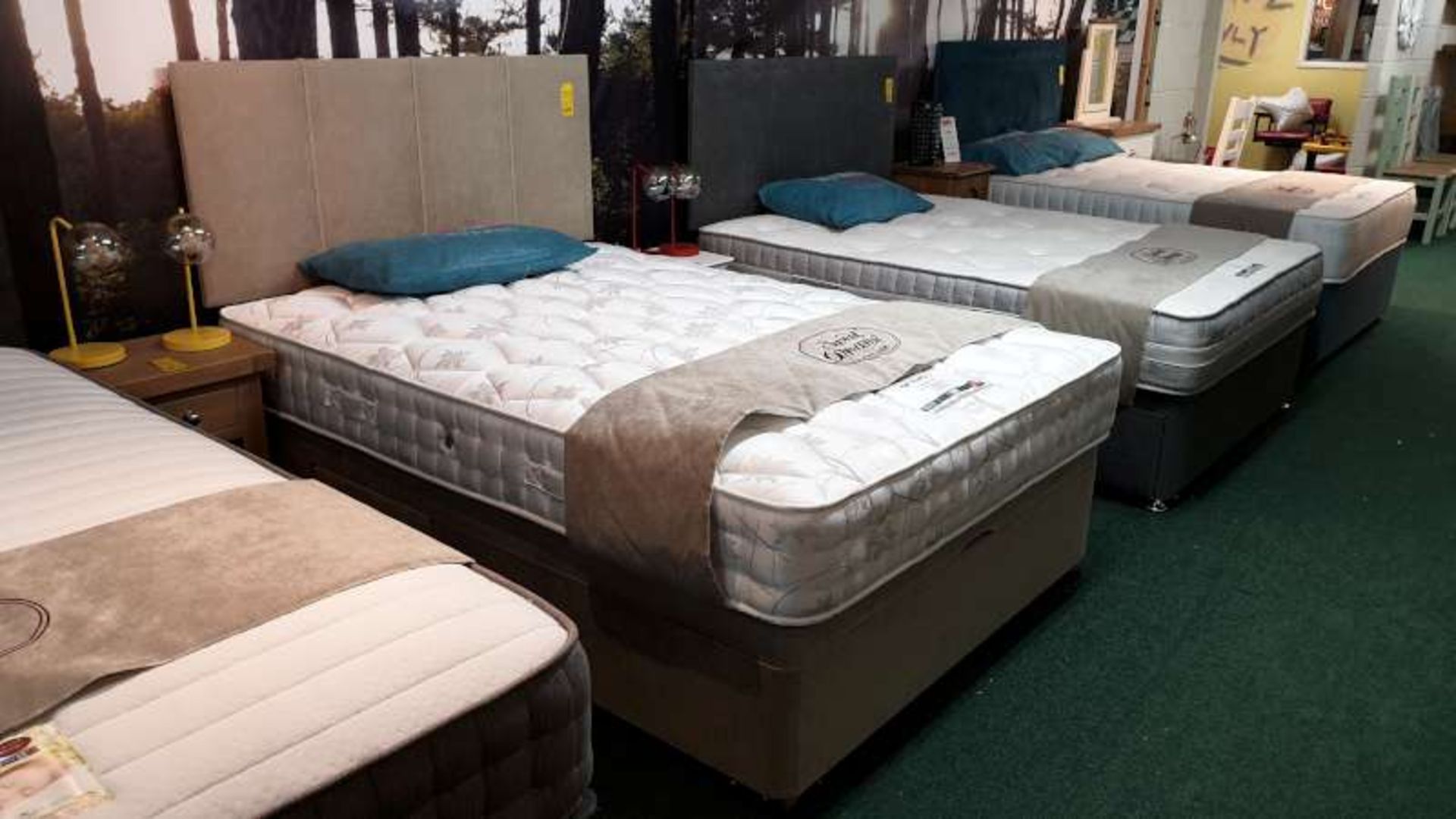 BEIGE MATERIAL DOUBLE BED WITH SIDE DRAWERS AND OTTOMAN COMPLETE WITH OLYMPUS ORTHO MATTRESS TOTAL