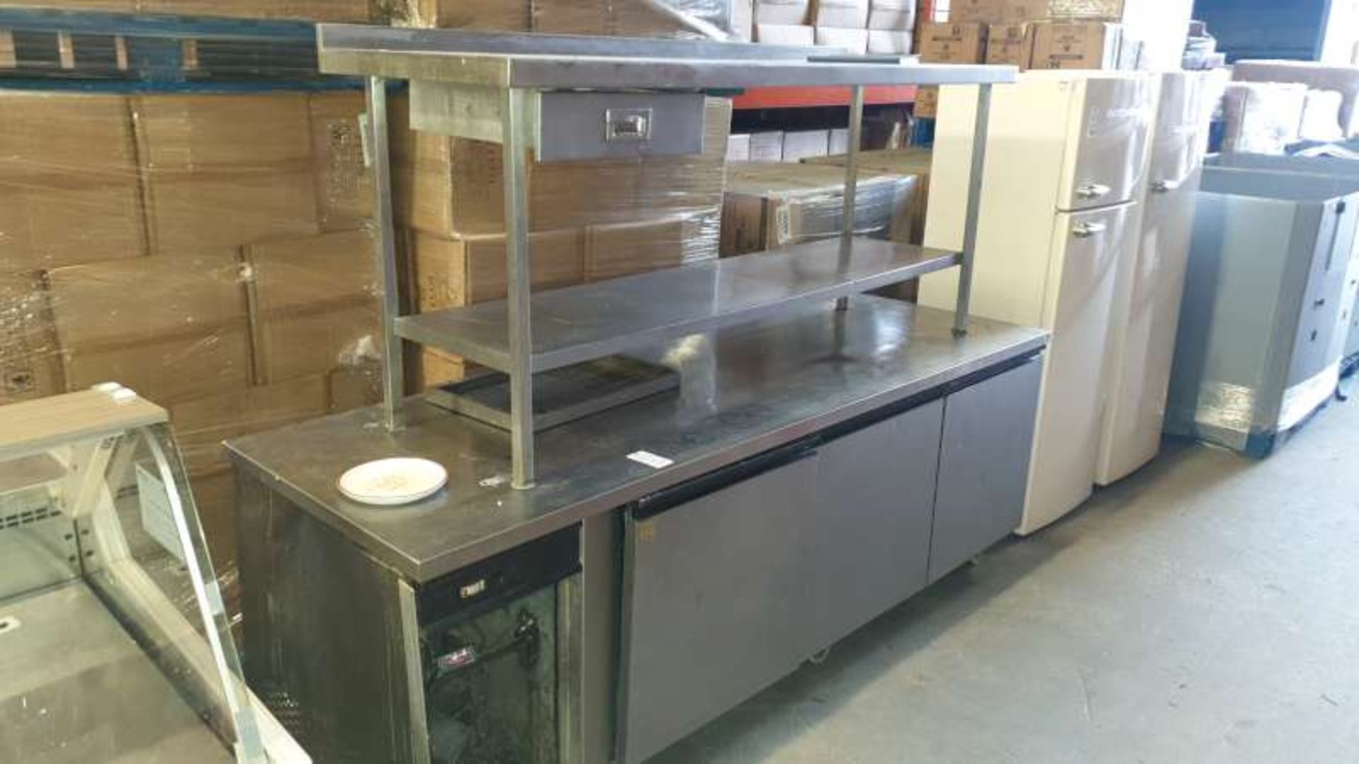 STAINLESS STEEL FOOD CHILLER AND A STAINLESS STEEL PREP TABLE