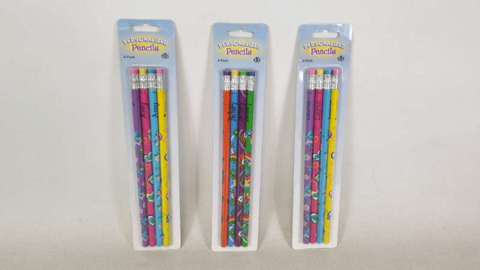 700 X PACKS OF 4 PERSONALIZED PENCILS IN VARIOUS NAMES IN 2 BOXES