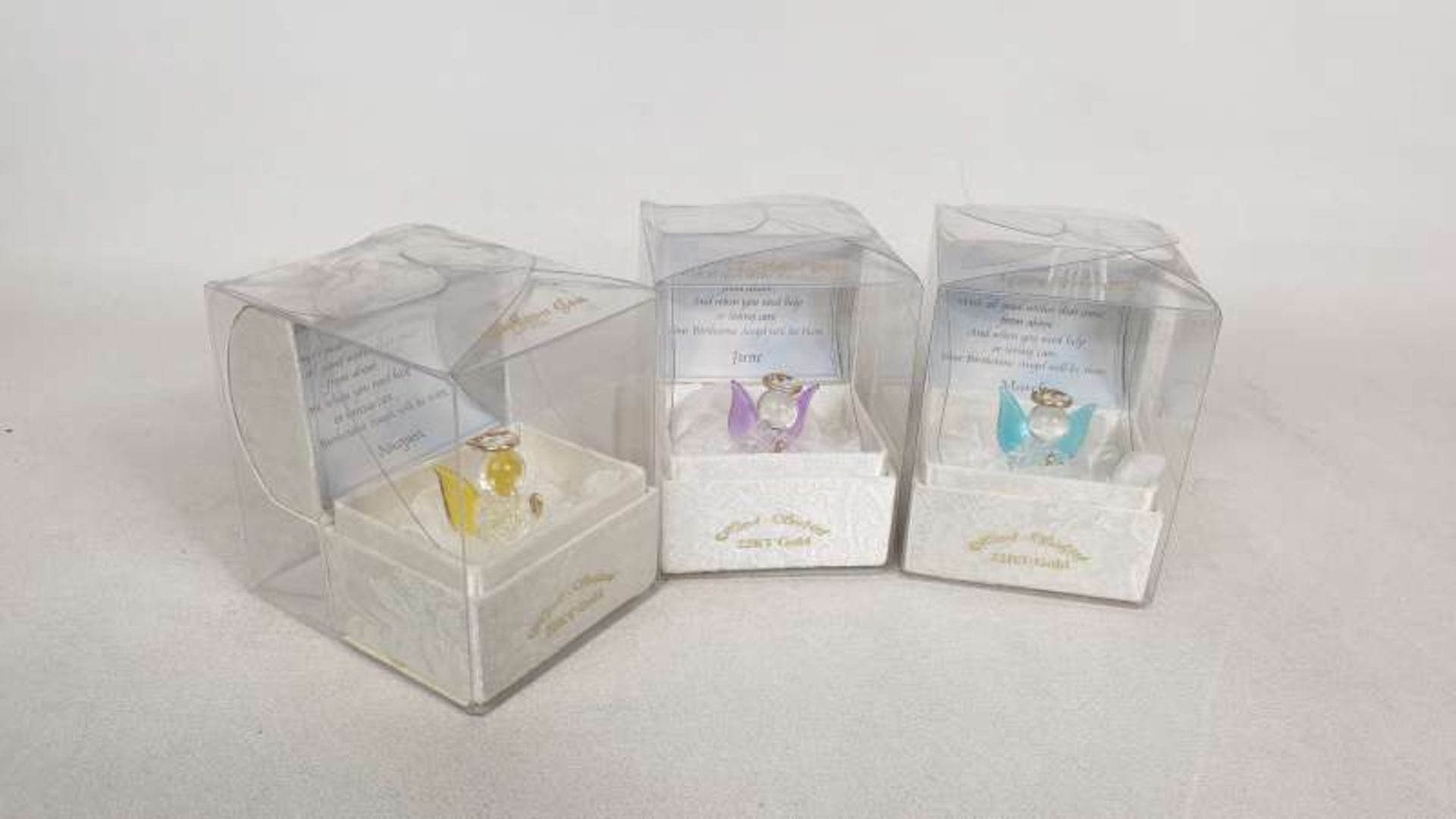 90 X BRAND NEW BOXED HAND SCULPTURED 22KT GOLD BIRTHSTONE ANGELS WITH CERTIFICATION OF