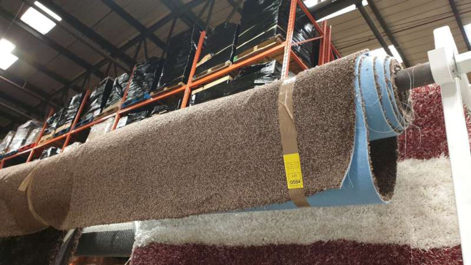 ROLL OF BROWN COLOURED CARPET APPROXIMATE SIZE 12' 10" X 13'