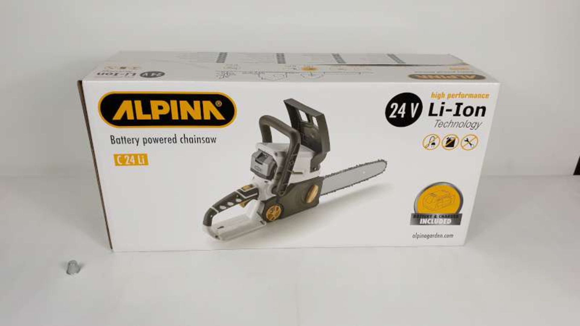 BRAND NEW BOXED ALPINA 24 VOLY LI - ION HIGH PERFORMANCE TECHNOLOGY CHAINSAW WITH BATTERY AND