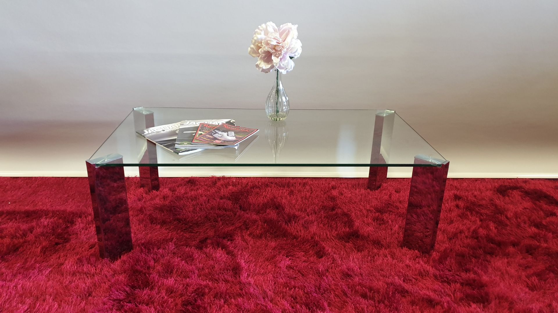 BRAND NEW GLASS COFFEE TABLE WITH CHROME LEGS SIZE W600 MM X L1100 MM X H380 MM RRP £299.00