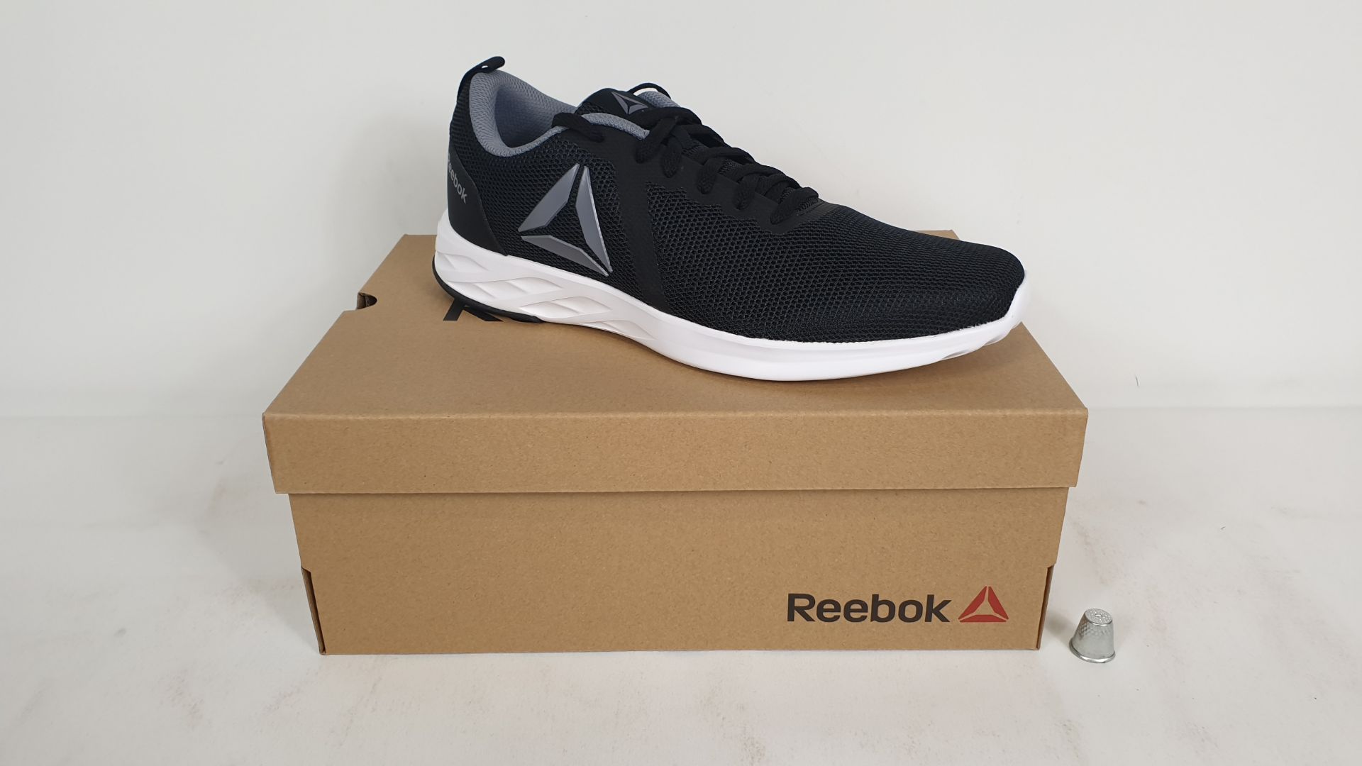 6 X PAIRS OF REEBOK TRAINERS ASTRO RIDE ESSENTIAL BLACK/ WHITE SIZE 10 - BRAND NEW AND BOXED