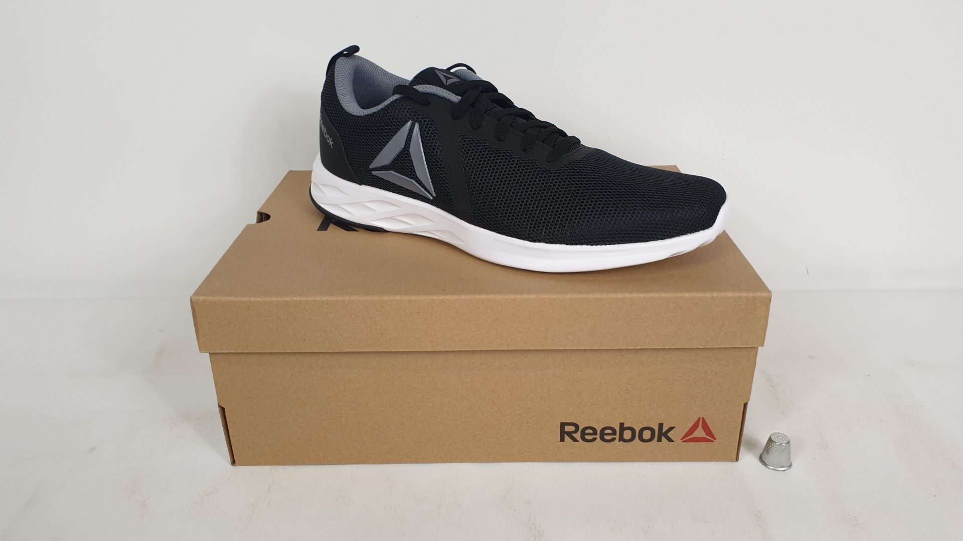 6 X PAIRS OF REEBOK TRAINERS ASTRO RIDE ESSENTIAL BLACK/ WHITE SIZE 9.5 - BRAND NEW AND BOXED