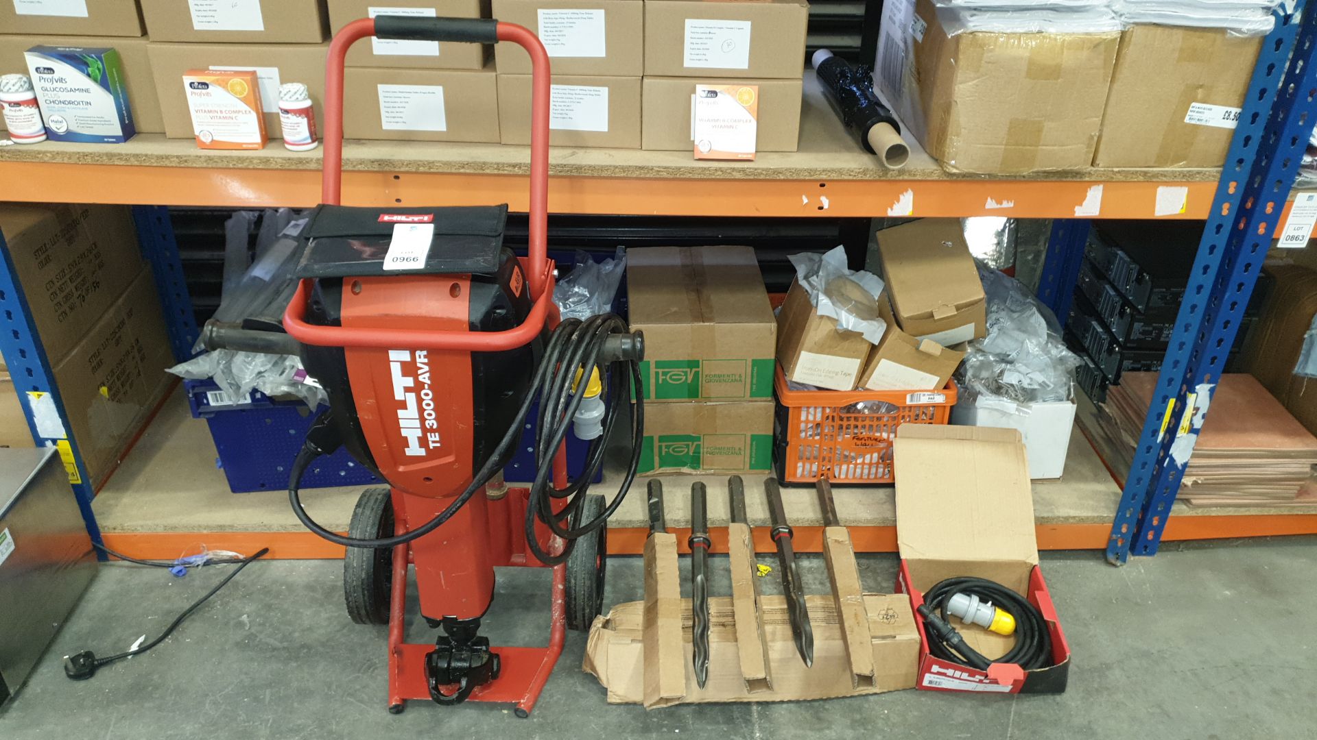 HILTI TE 3000-AVR BREAKER - 110V WITH A 110V EXTENSION CABLE, CARRY TROLLEY, 3 USED AND 5 BRAND