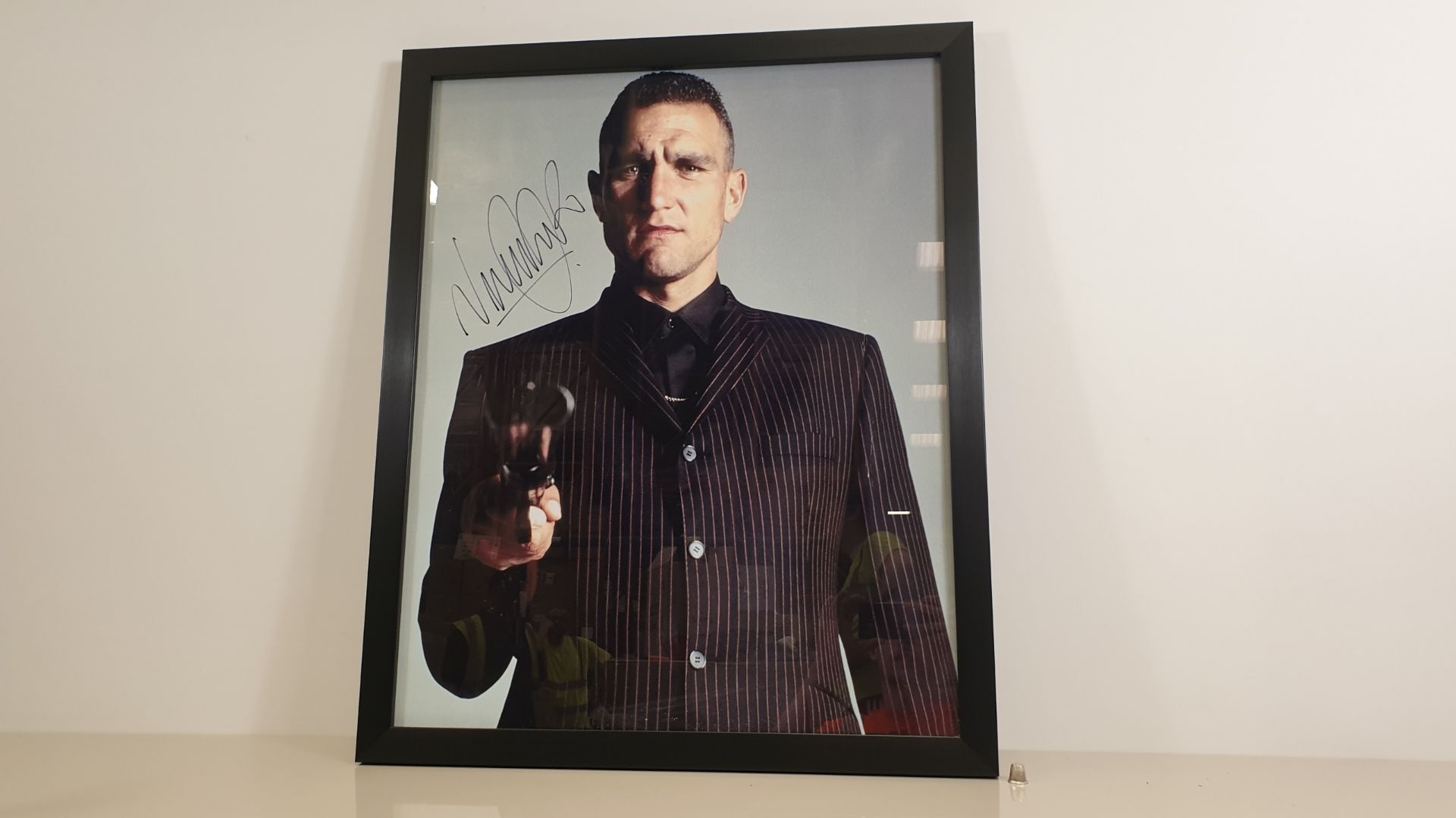 VINNIE JONES PERSONALLY SIGNED PICTURE - GOOD CONDITION WITH CERTIFICATE OF AUTHENTICITY