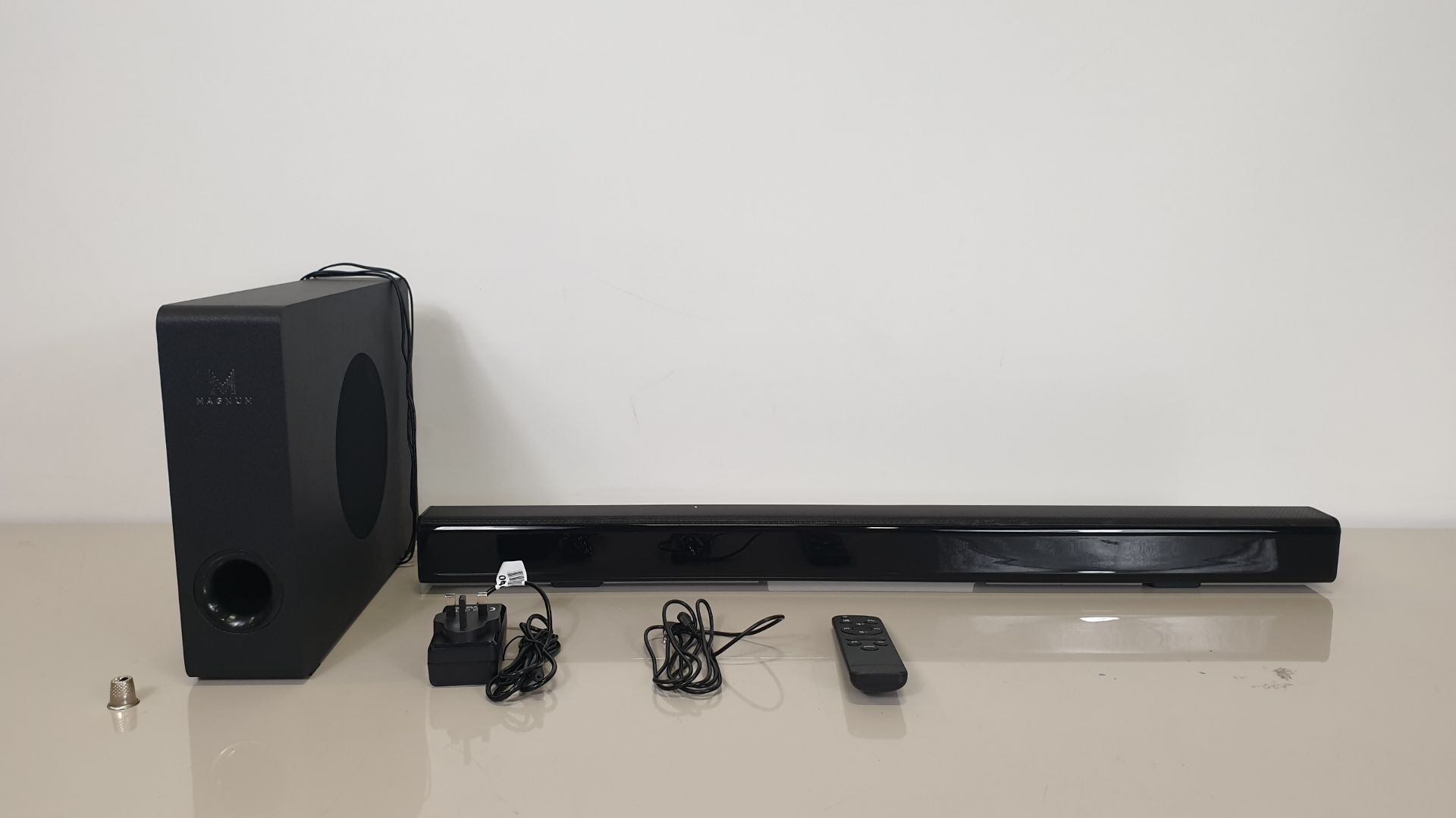 BRAND NEW BOXED MAGNUM POWERFUL SOUNDBAR AND SUBWOOFER - REMOTE INCLUDED