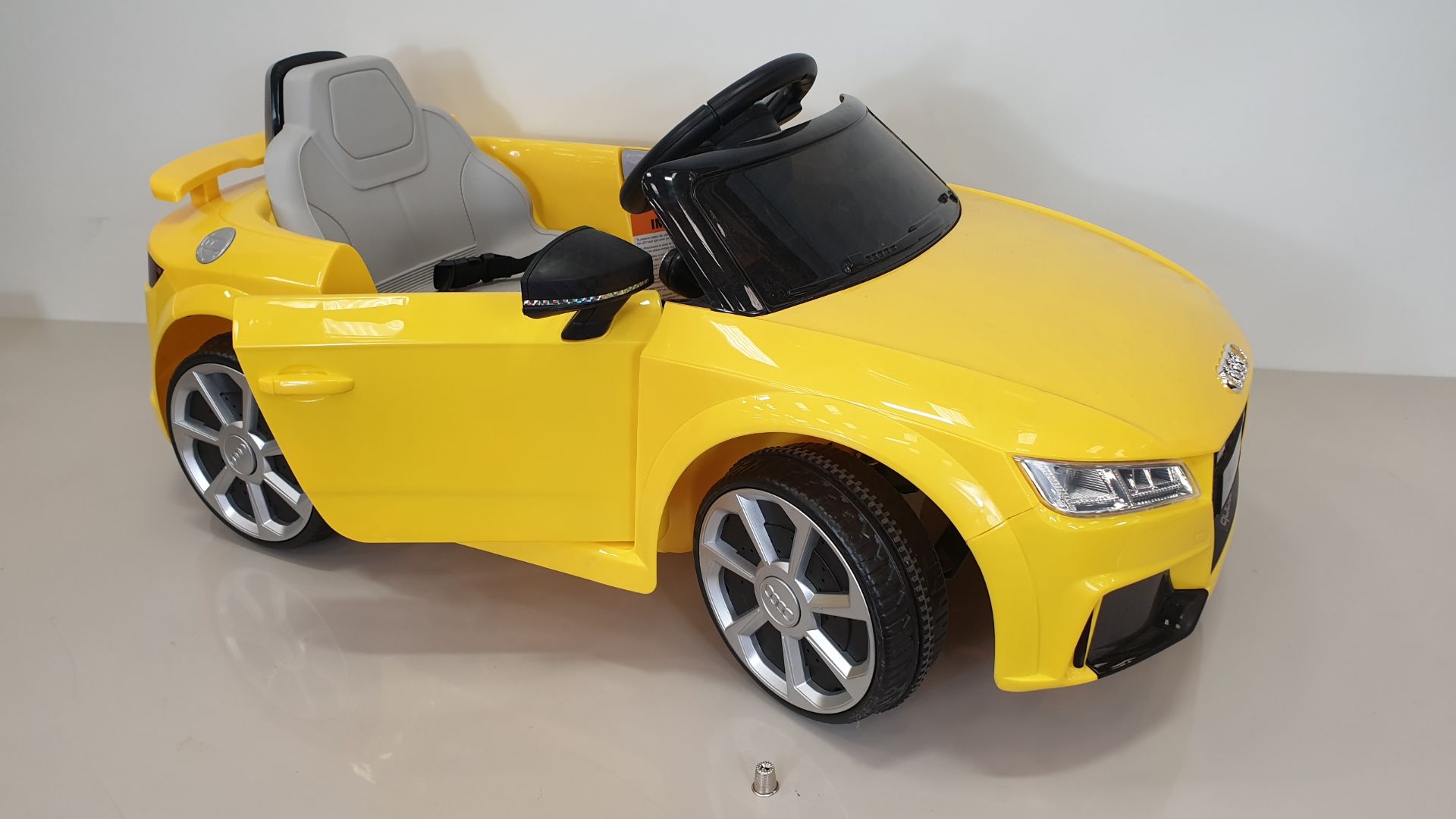 BRAND NEW BOXED RIDE-ON AUDI TT RS ROADSTER IN YELLOW (BATTERY POWERED 6V W/RC) FORWARD AND