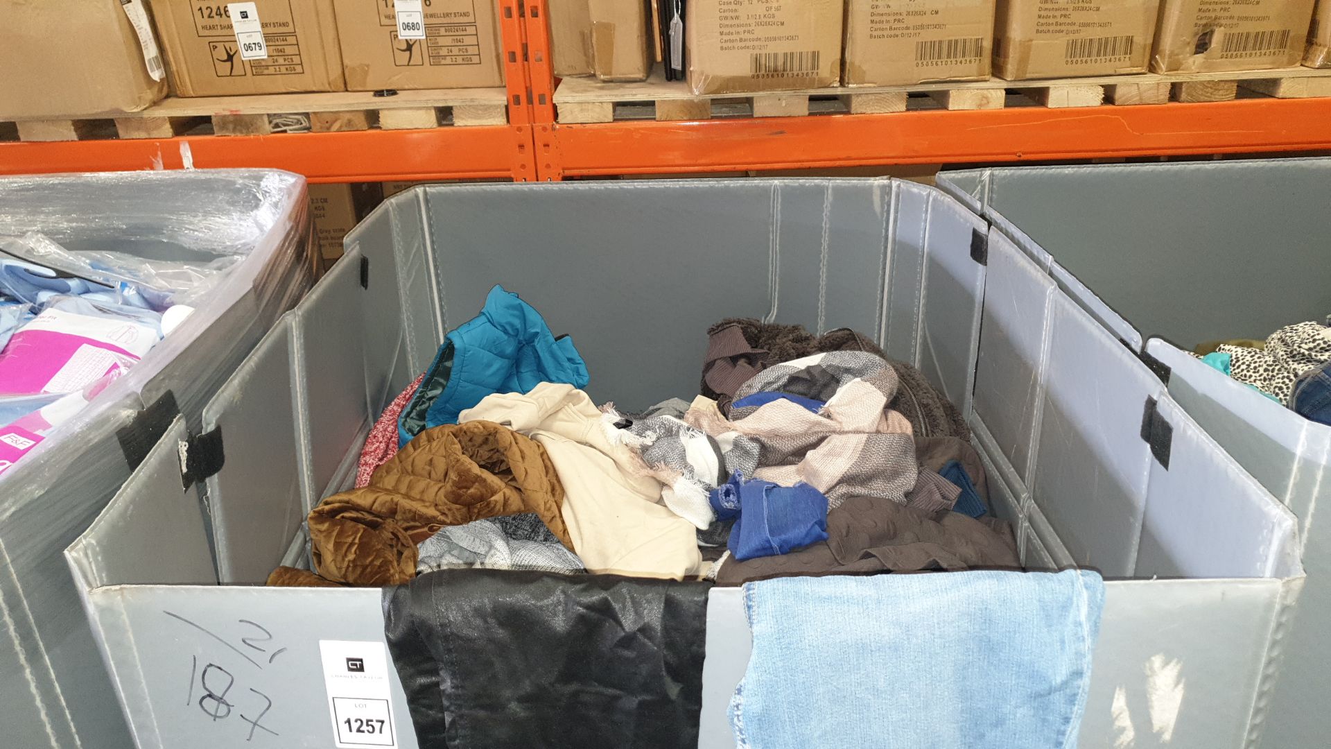 FULL PALLET OF MAINLY WOMENS CLOTHING IN ASSORTED STYLES AND SIZES IE. CARDIGANS, BLOUSES, JEANS,