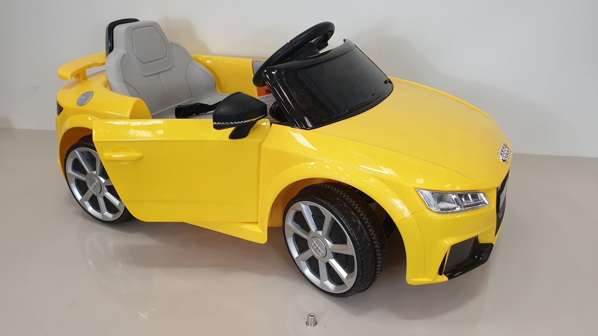 BRAND NEW BOXED RIDE-ON AUDI TT RS ROADSTER IN YELLOW (BATTERY POWERED 6V W/RC) FORWARD AND