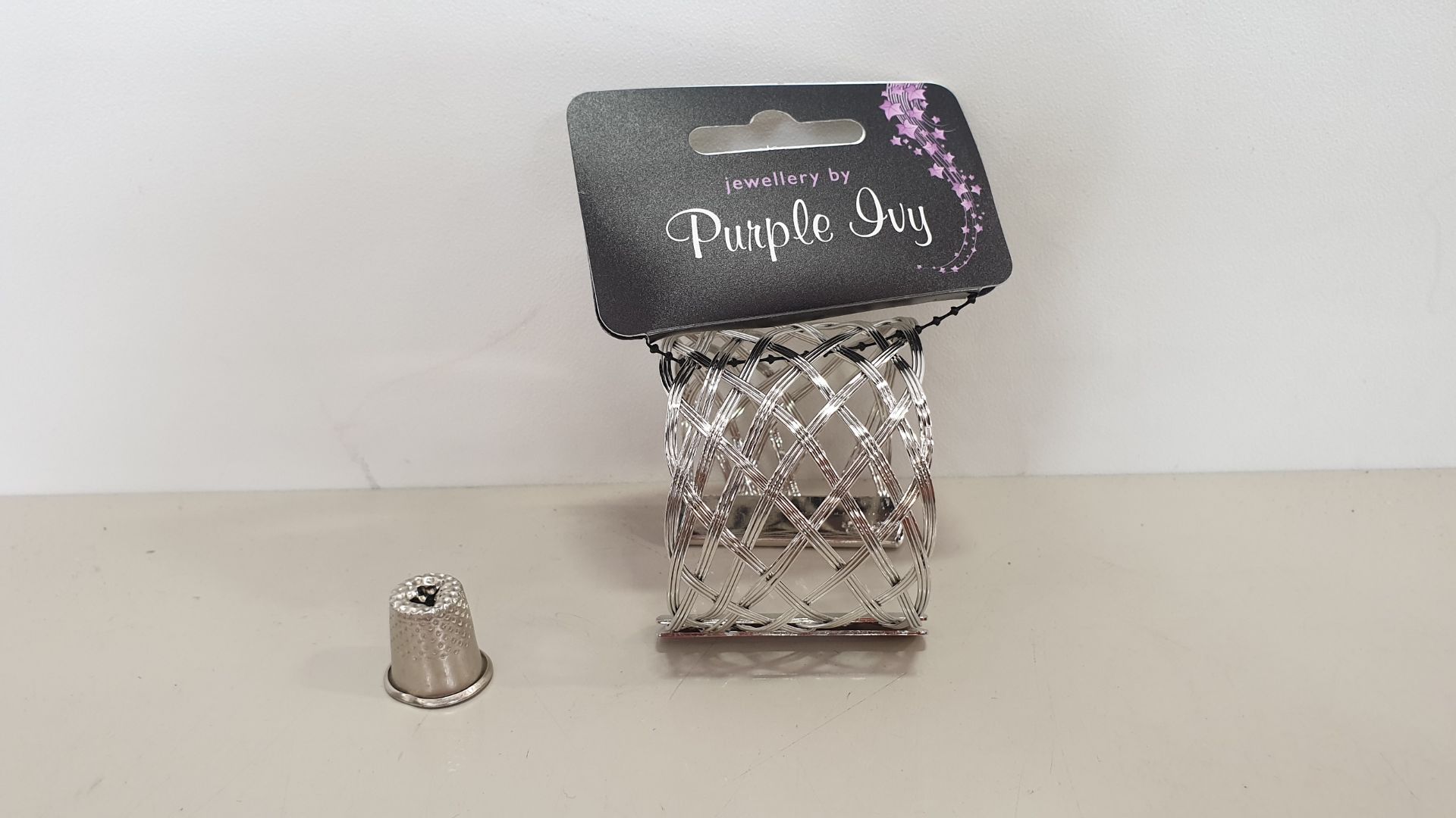 PALLET CONTAINING APPROX 2888 PURPLE IVY SILVER CUFF BRACELETS