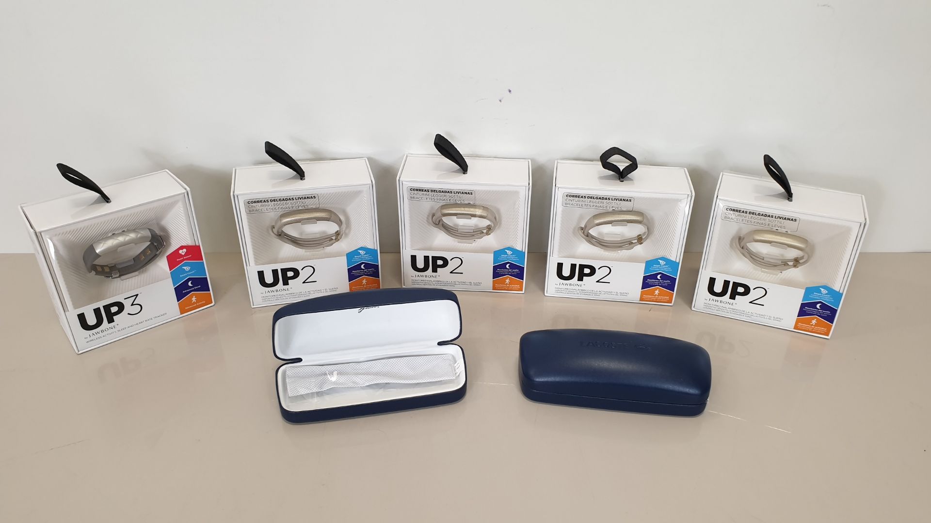 5 X NEW UP3 JAWBONE SLEEP & HEART RATE TRACKERS AND 2 X NEW LACOSTE GLASSES CASE